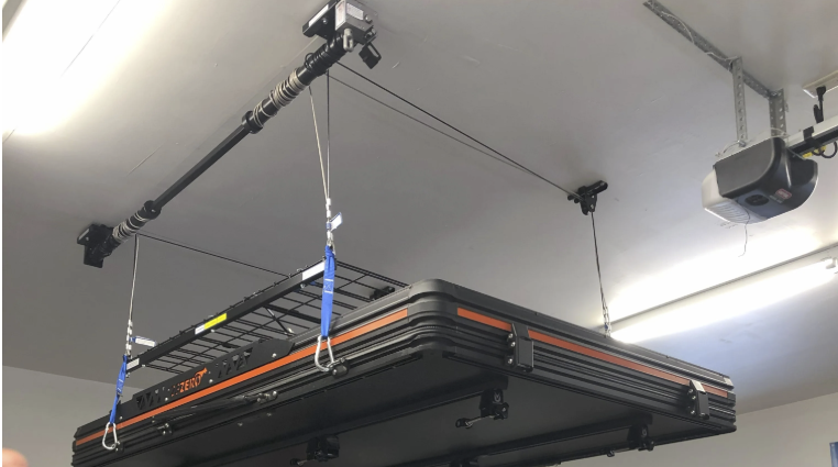 Come sollevare e riporre la tenda da tetto nel garage: Guida al Paranco a soffitto